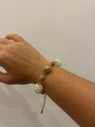 Bracciale donna perle e dettagli dorati