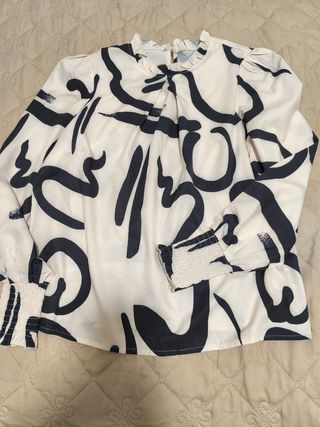 Blusa estampada manga larga