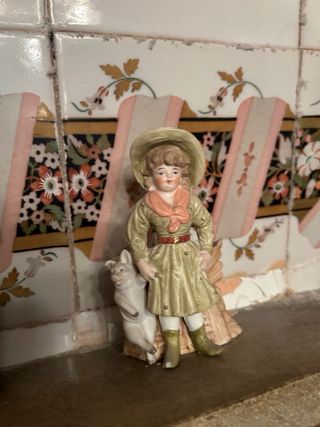 Figura pastoral de porcelana