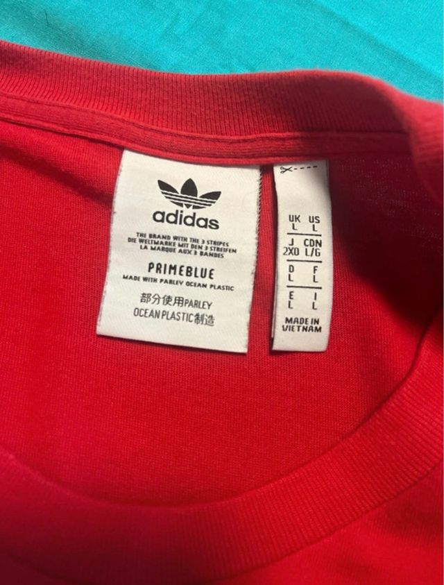 T-shirt Adidas rossa con logo