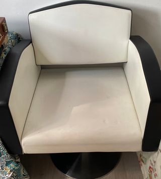 Sillón de peluquería o estética.
