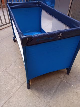 Cuna de viaje azul
