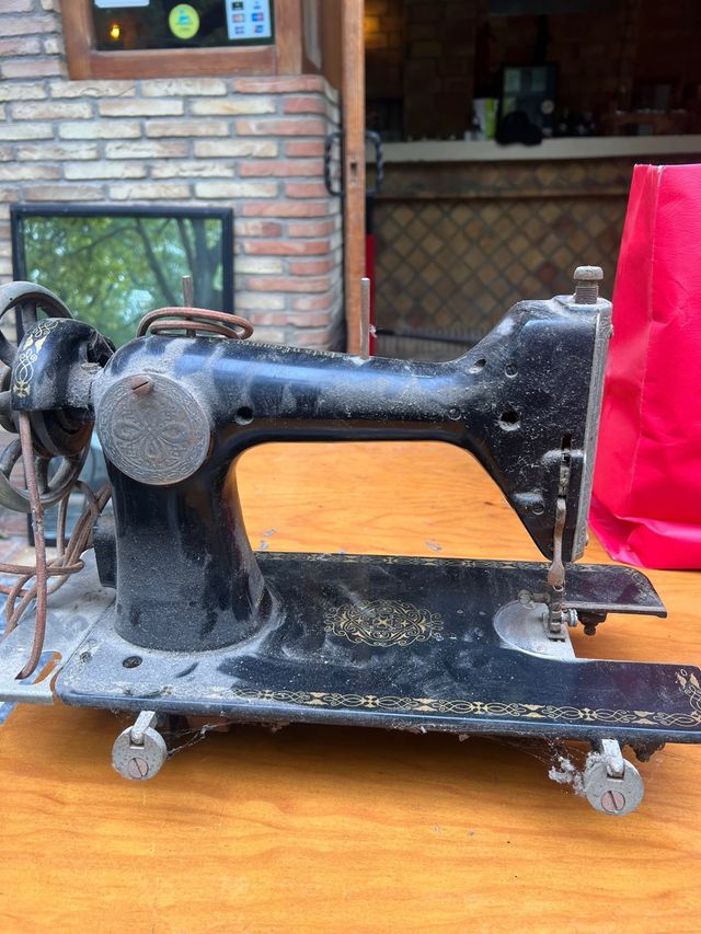 Máquina de coser Sigma antigua
