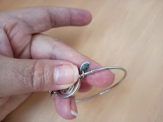 PULSERA LOTUS DE ACERO RÍGIDA MANO DE FÁTIMA