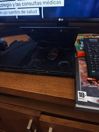 PlayStation 2 usada. Sin mandos. 
5 juegos + demos