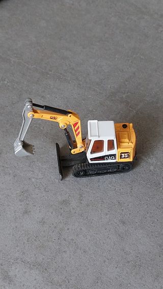 Escavatore Welly giallo e bianco