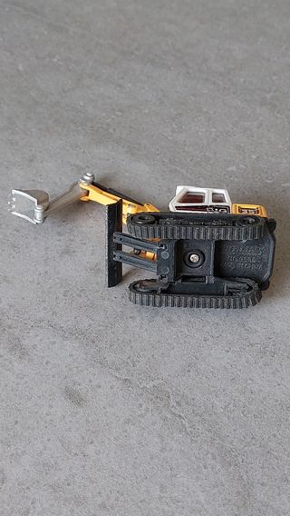 Escavatore Welly giallo e bianco