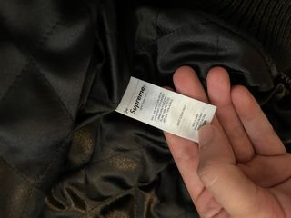 Supreme Praises Varsity Jacket Negra Blanca