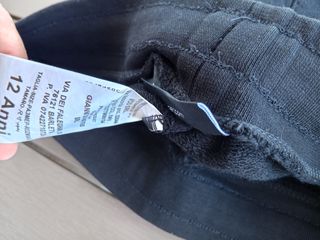 Pantaloncini neri con fiamme verdi