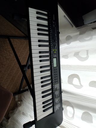 Teclado electrónico con soporte
