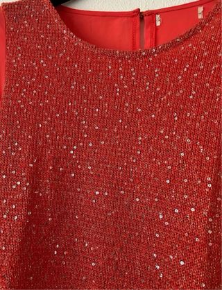 Blusa naranja con lentejuelas