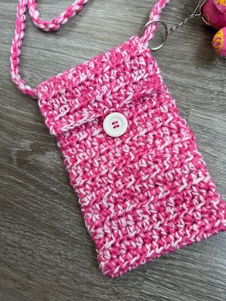 Bolso móvil crochet hecho a mano rosa