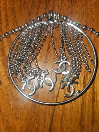 Colgante" Chanel"  Plateado
