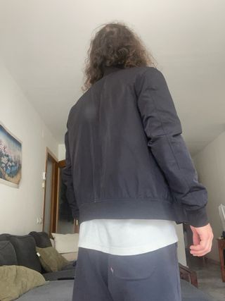 Chaqueta vintage bomber negra, forro rojo