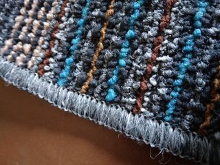 Tappeti tessuto blu e marrone