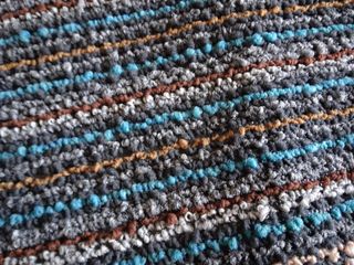 Tappeti tessuto blu e marrone