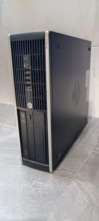 Torre PC HP Compaq Negra y Platead
