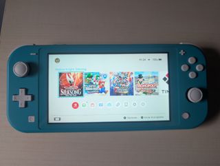 Switch lite + 256 gb + juegos 