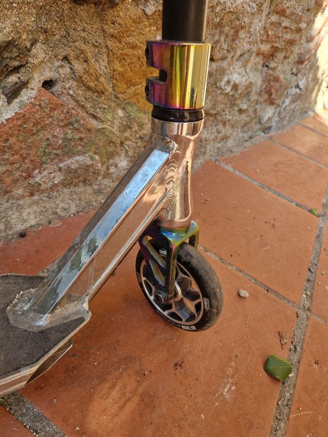 Patinete profesional trucos