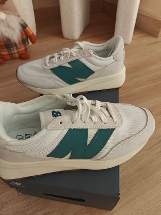 New Balance 370 Blancas/Teal Talla 40