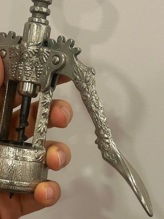 Cavatappi vintage in metallo decorato