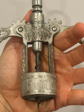 Cavatappi vintage in metallo decorato