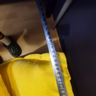 Sillón cama amarillo de tela