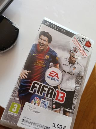 PSP Sony negra con juegos modelo 2000