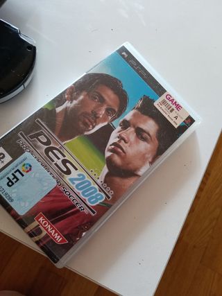 PSP Sony negra con juegos modelo 2000