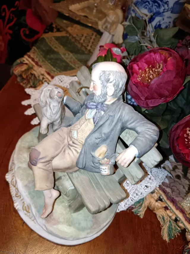 Statuina Capodimonte uomo con cane