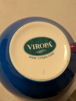 Teiera e tazza con pesci