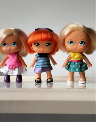 7 Muñecas Barriguitas siempre juntas.