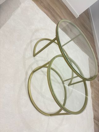 Tavoli rotondi in vetro e metallo dorato