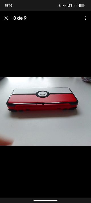 Nintendo 2DS XL Poké Ball + 2 juegos