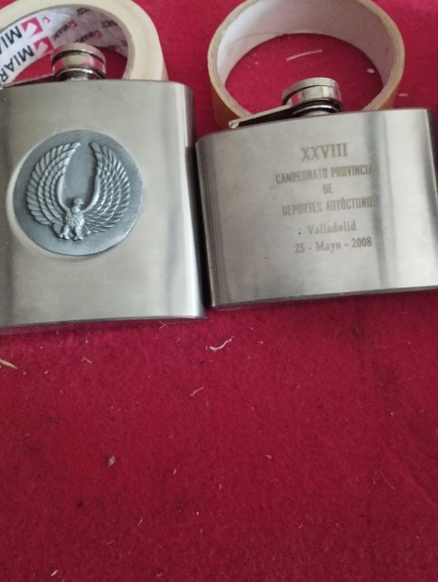 Tappeto di liquore inciso su acciaio entrambi 10€