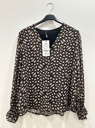 Blusa estampada manga larga