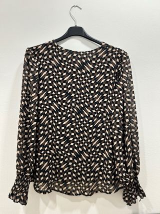 Blusa estampada manga larga