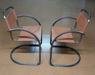 2 comode sedie vintage in metallo e pelle bovina