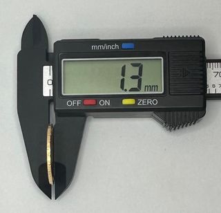 Moneda de oro de 21,6k, 7.97 g.