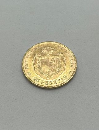 Moneda de oro de 21,6k, 7.97 g.