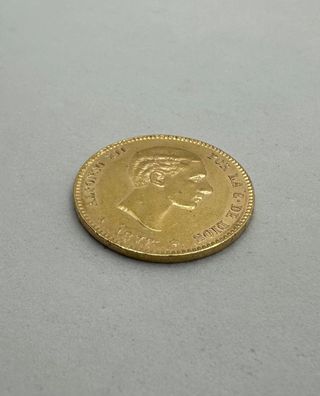 Moneda de oro de 21,6k, 7.97 g.