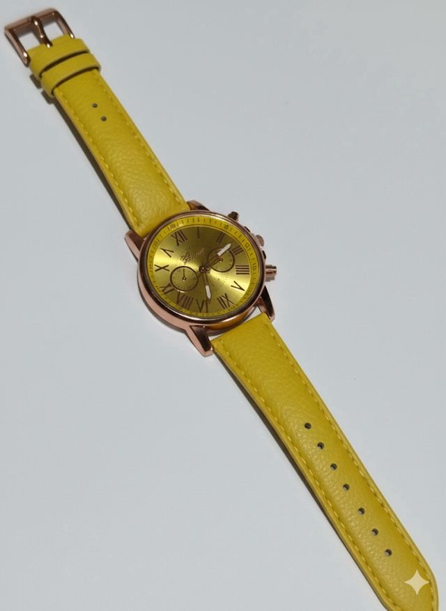 Orologio elegante arancione e giallo