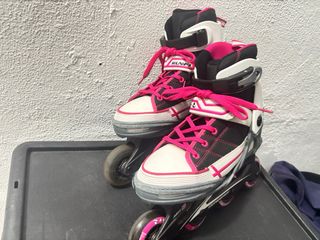 Patines en línea blancos y rosas