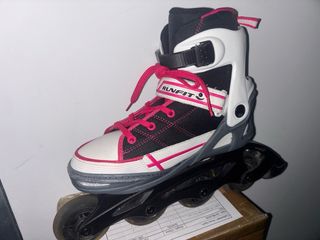 Patines en línea blancos y rosas