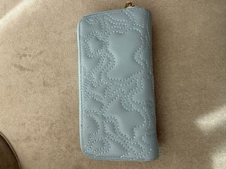 Cartera Tous azul y dorada