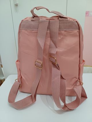 Zainetto donna trapuntato rosa con borchie oro