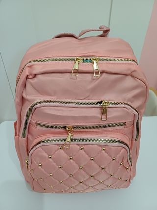 Zainetto donna trapuntato rosa con borchie oro