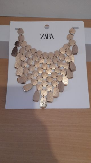 Collar babero metal dorado Zara
