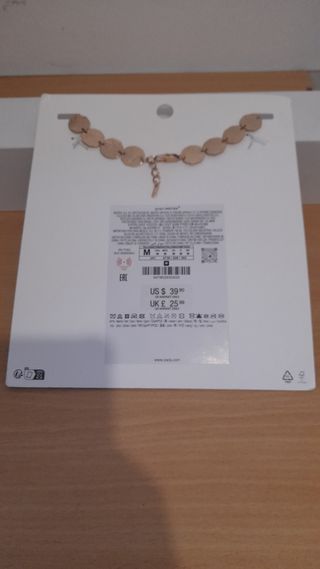 Collar babero metal dorado Zara