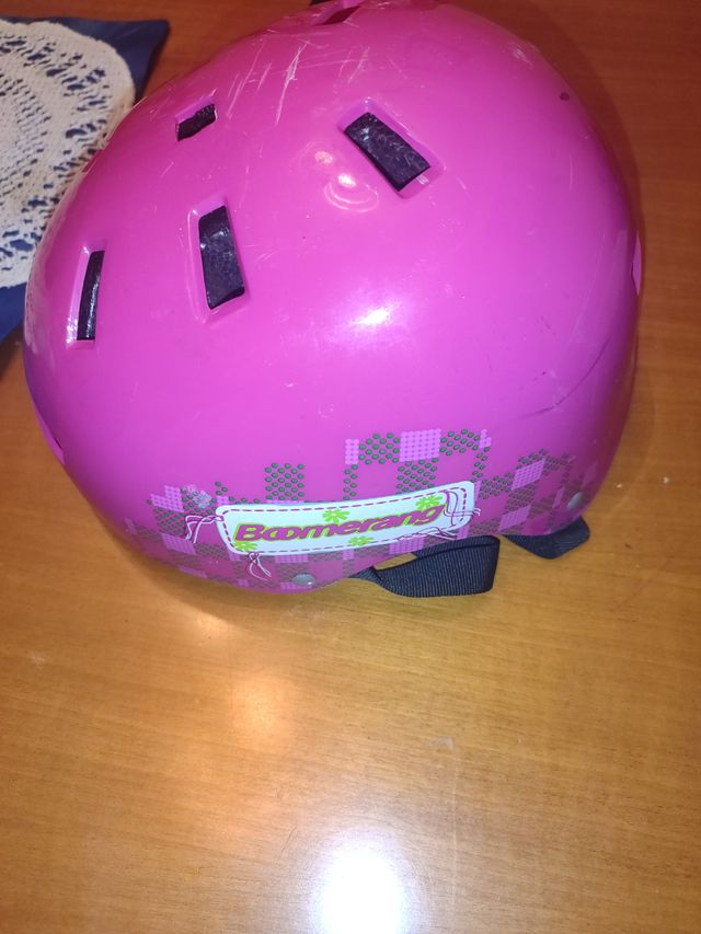 Casco bici niña rosa solo arañazos por encima 